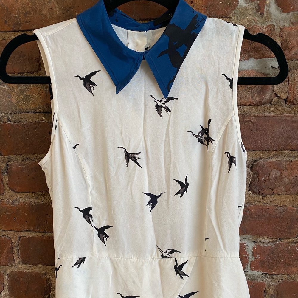 White and blue sleeveless bird top!